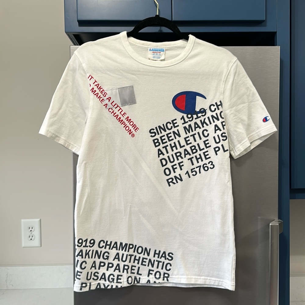 Champion Tee